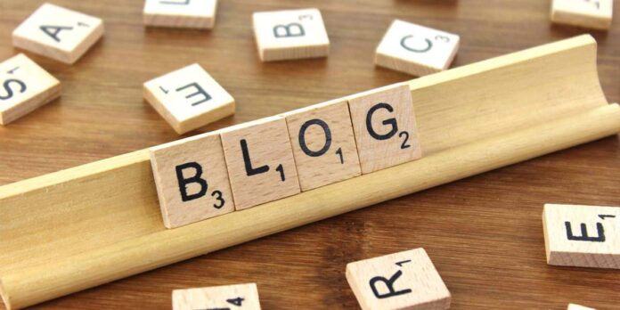 make money from blogging - A wooden tiled board